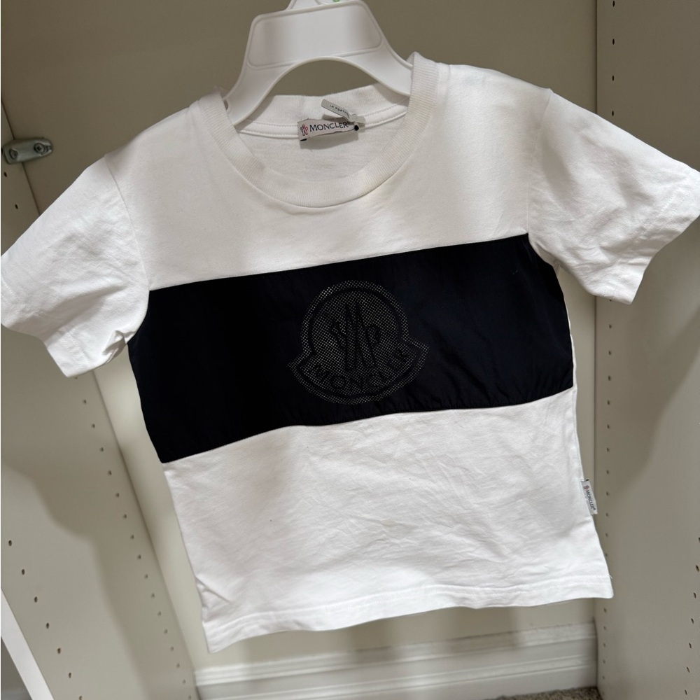 Moncler shirt for boys. Size is 4Y and the color is white and black.